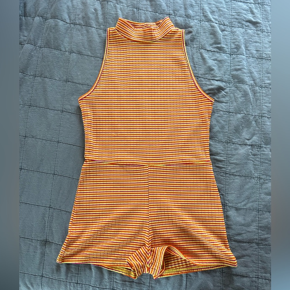 Colorful romper with a high neckline!